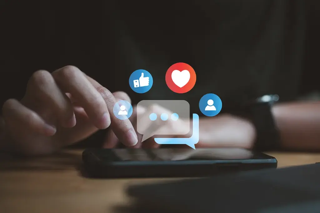 Phone in hands with overlay of heat and likes.